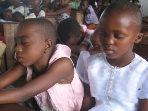 Children are praying for peace in the Democratic Republic of Congo.